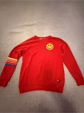Aviator Nation Red Crewneck with Yellow Smiley & Multicolor Sleeve Stripes